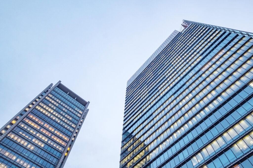 windows of skyscraper business office buildings, corporate building in tokyo city, japan.